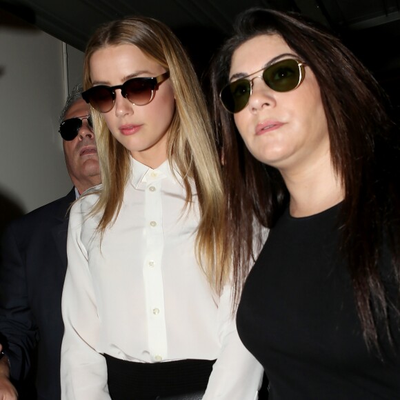 Amber Heard arrive au tribunal pour sa déposition contre Johnny Depp pour violences conjugales dans la procédure de divorce à Century City, le 13 août 2016.