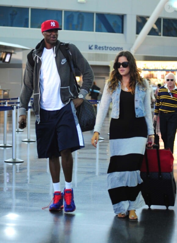 Khloé Kardashian et son mari Lamar Odom à l'aéroport de New York, le 19 juin 2012