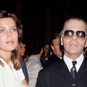 Caroline de Monaco et Karl Lagerfeld au défilé Chanel collection automne/hiver 1988-1989, le 24 juillet 1988