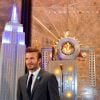 David Beckham, ambassadeur de l'UNICEF, illumine l'empire State Building pour les 70 ans de l'UNICEF à New York le 12 décembre 2016.