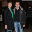 Christophe Alévêque et sa femme Serena Reinaldi - Début de la tournée des "Pères Noël verts" 2014 à l'occasion des 70 ans du Secours populaire au Palais de l'Unesco à Paris le 8 décembre 2014.