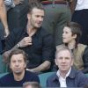 David Beckham et ses enfants Cruz et Romeo au tournoi de Tennis de Wimbledon le 5 juillet 2016.