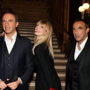 Nikos Aliagas avec sa compagne Tina Grigoriou lors de la réception organisée en l'honneur de son entrée au musée Grévin. Paris, le 7 décembre 2016.