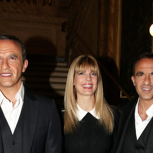 Nikos Aliagas avec sa compagne Tina Grigoriou lors de la réception organisée en l'honneur de son entrée au musée Grévin. Paris, le 7 décembre 2016.