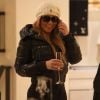 Exclusif - Mariah Carey fait du shopping avec ses enfants Moroccan et Monroe dans la boutique Louis Vuitton avec une coupe de champagne à la main à Aspen dans le Colorado le 23 décembre 2016