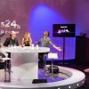 Rachel Mouyal et Laurent Argelier sur le plateau du tournage de l'émission "Les 24h de la TV réalité", le 21 décembre 2016.