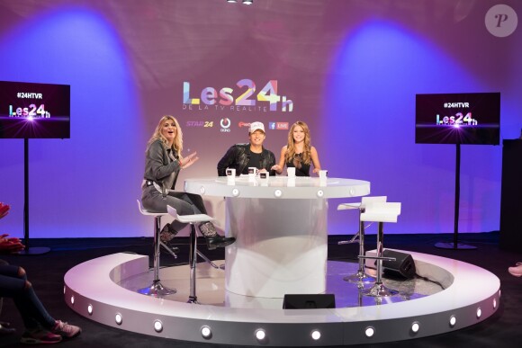 Rachel Mouyal, Mélanie et Laurent Argelier sur le plateau du tournage de l'émission "Les 24h de la TV réalité", le 21 décembre 2016.