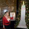 Mariah Carey illumine l'Empire State Building à New York le 6 décembre 2016.