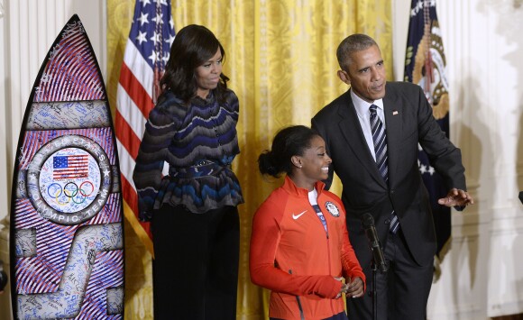 Barack, Michelle Obama et Simone Biles à la Maison Blanche. Washington, le 29 septembre 2016.