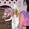 Katie Price déguisée en licorne avec son mari Kieran Hayler et ses enfants Junior et Princess lors de son évènement "Pony Club press launch & Photocall" à Londres, le 27 avril 2016