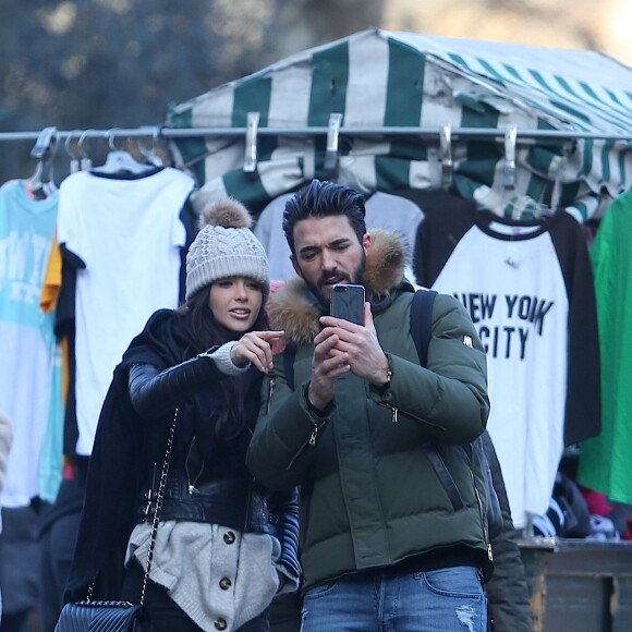 Exclusif - Nabilla Benattia et son compagnon Thomas Vergara lors de leur dernière journée à New York, le 19 décembre 2016. Ils ont visité Central Park, ont fait du shopping chez Victoria's Secret et Zara, puis ont déjeuné au Yankee Steakhouse à côté du Rockfeller Center. Nabilla est à New York car elle va faire une apparition surprise dans la série "Orange Is the New Black" de Netflix où elle va jouer le rôle d'une femme en prison.