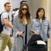 John Legend et sa femme Chrissy Teigen arrivent à l'aéroport de Miami avec leur fille Luna le 27 décembre 2016.