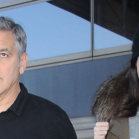 George et Amal Clooney à l'aéroport de Los Angeles, le 27 janvier 2017.