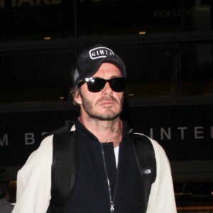 David Beckham arrive à l'aéroport LAX de Los Angeles, le 29 janvier 2017.