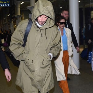 David et Victoria Beckham arrivent à Londres par l'Eurostar en provenance de Paris le 23 janvier 2017.