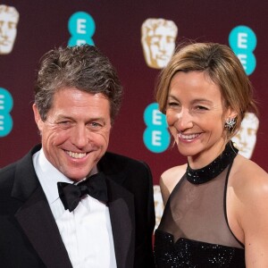 Hugh Grant et sa compagne Anna Elisabet Eberstein - Arrivée des people à la cérémonie des British Academy Film Awards (BAFTA) au Royal Albert Hall à Londres, le 12 février 2017.