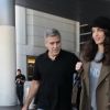 George Clooney et sa femme Amal, enceinte, arrivent à l'aéroport de Los Angeles (LAX), le 27 Janvier 2017.
