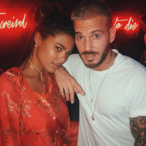 Tina Kunakey pose avec M. Pokora en février 2017