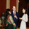 Le prince William et la duchesse Catherine de Cambridge avec une invitée lors de la réception donnée le 27 février 2017 à Buckingham Palace en l'honneur du lancement de l'année culturelle UK - India et des 70 ans de l'indépendance de l'Inde.