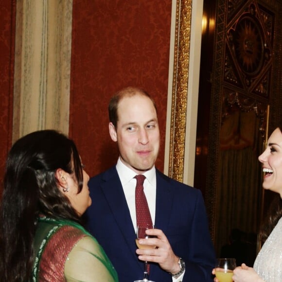 Le prince William et la duchesse Catherine de Cambridge avec une invitée lors de la réception donnée le 27 février 2017 à Buckingham Palace en l'honneur du lancement de l'année culturelle UK - India et des 70 ans de l'indépendance de l'Inde.