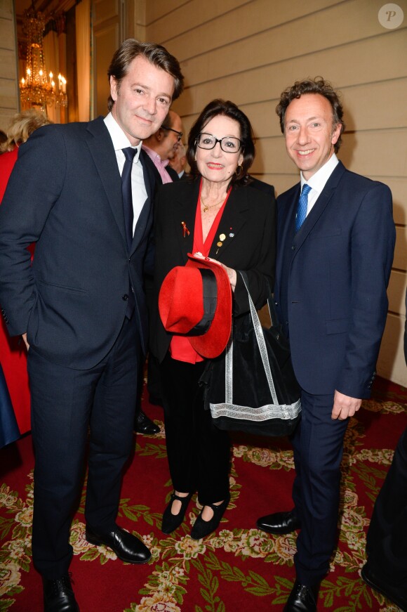 François Baroin, Nana Mouskouri et Stéphane Bern lors de l'élévation de L. Renaud au rang de grand-croix de l'ordre national du Mérite, au Palais de l'Elysée à Paris, le 23 mars 2017. © Guirec Coadic/Bestimage