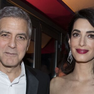 George Clooney et sa femme Amal Alamuddin (enceinte) - Dîner de la cérémonie des César au Fouquet's à Paris. Le 24 février 2017 © Olivier Borde-Dominique Jacovides / Bestimage