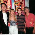  Stone avec son fils Baptiste et son mari Mario avec son fils Maxime à Paris le 2 septembre 1998. 