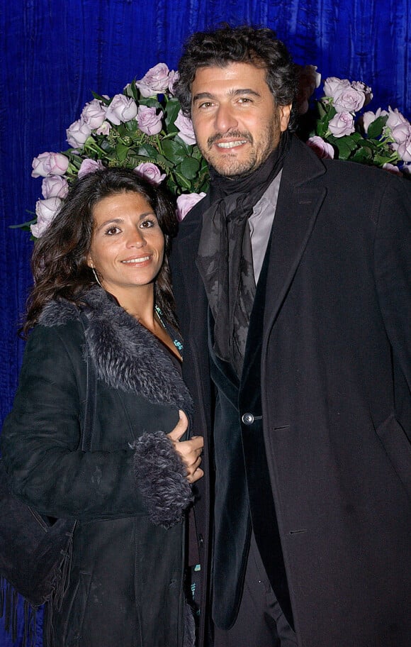 Daniel Lévi pose avec sa femme Laure au Lido le 21 octobre 2013.