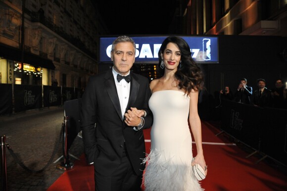 Exclusif - George Clooney et sa femme Amal Alamuddin-Clooney (enceinte) - 42ème cérémonie des César à la Salle Pleyel à Paris, le 24 février 2017.