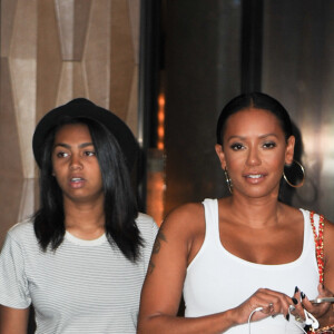 Mel B (Melanie Brown) et sa fille Phoenix Chi Gulzar quittent leur hôtel pour se rendre à l'enregistrement de l'émission de radio "Howard Stern Show" à New York, le 29 juillet 2014.