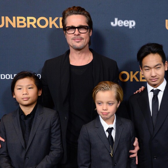 Brad Pitt, Maddox Jolie-Pitt, Pax Jolie-Pitt et Shiloh Jolie-Pitt à la première du film "Unbroken" à Hollywood, le 15 décembre 2014