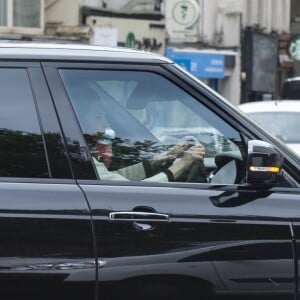 Kate Middleton au volant de son Range Rover à Londres, de retour au palais de Kensington après une ultime répétition pour le mariage de sa soeur Pippa à Englefield.