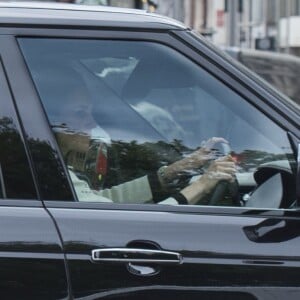 Kate Middleton au volant de son Range Rover à Londres, de retour au palais de Kensington après une ultime répétition pour le mariage de sa soeur Pippa à Englefield.