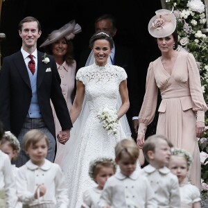 Pippa Middleton, son mari James Matthews et Catherine (Kate) Middleton, duchesse de Cambridge - Mariage de Pippa Middleton et James Matthews, en l'église St Mark's Englefield, Berkshire, Royaume Uni, le 20 mai 2017.