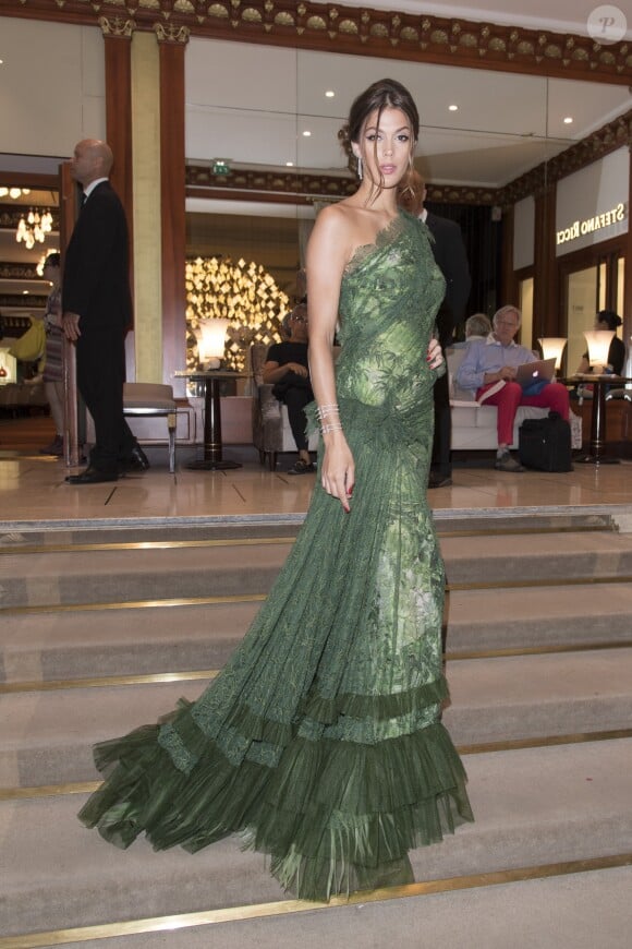 Semi-exclusif - Iris Mittenaere (Miss France et Miss Univers 2016), en robe Jean Paul Gaultier et parée de bijoux Messika, à l'hôtel Majestic Barrière lors du 70e Festival International du Film de Cannes, le 24 mai 2017, prête pour la montée des marches. © Pierre Perusseau/Bestimage