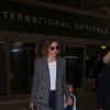Miranda Kerr arrive à l'aéroport LAX de Los Angeles avec son fils Flynn et son compagnon Evan Spiegel le 3 juillet 2016