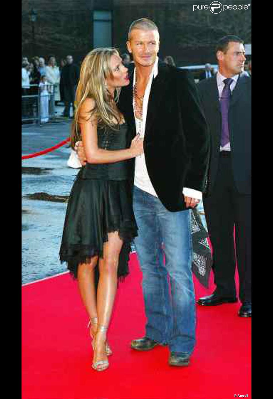 David Et Vicky A Une Soiree De Londres Jean Et Veste Noir Pour Lui Le Look Simple Mais Qui Fait Toujours Son Effet Et Pour En Rajouter Au Style David N A