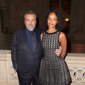 Luc Besson et sa femme Virginie Silla - Remise de la Médaille d'Or de l'Académie des Arts et Techniques du Cinéma à Luc Besson par Alain Terzian, à la Monnaie de Paris, le 19 janvier 2015.