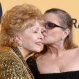 Carrie Fisher et sa mère Debbie Reynolds à la press room des SAG Awards à Los Angeles le 26 janvier 2015.