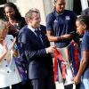 Le président de la République Emmanuel Macron et sa femme Brigitte Macron (Trogneux) reçoivent l'équipe de football féminine de l'Olympique lyonnais (qui a remporté la ligue des Champions) au Palais de l'Elysée à Paris, le 20 juin 2017. © Dominique Jacovides/Bestimage