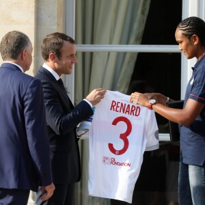 Le président de la République Emmanuel Macron et sa femme Brigitte Macron (Trogneux) reçoivent l'équipe de football féminine de l'Olympique lyonnais (qui a remporté la ligue des Champions) au Palais de l'Elysée à Paris, le 20 juin 2017. © Dominique Jacovides/Bestimage