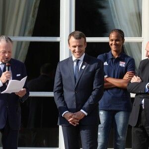 Le président de la République Emmanuel Macron et sa femme Brigitte Macron (Trogneux) reçoivent l'équipe de football féminine de l'Olympique lyonnais (qui a remporté la ligue des Champions) au Palais de l'Elysée à Paris, le 20 juin 2017. © Dominique Jacovides/Bestimage