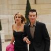 Thomas Voeckler et sa femme Julie dans la cour de l'Elysée le 24 juillet 2011.