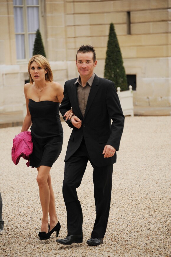 Thomas Voeckler et sa femme Julie au palais de l'Elysée le 24 juillet 2011.