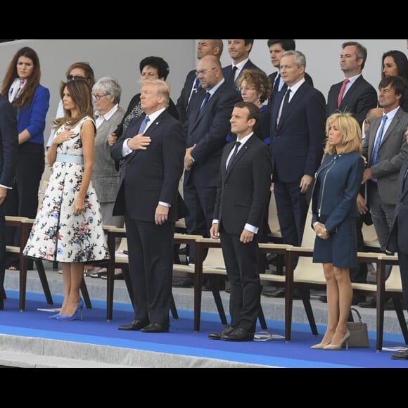 Emmanuel Macron, sa femme Brigitte Macron (Trogneux) , Donald Trump et sa femme Melanie Trump lors du défilé du 14 juillet (fête nationale) à Paris