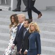 Emmanuel Macron, sa femme Brigitte Macron (Trogneux) , Donald Trump et sa femme Melanie Trump lors du défilé du 14 juillet (fête nationale) à Paris