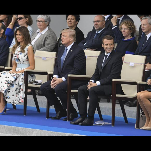 Emmanuel Macron, sa femme Brigitte Macron (Trogneux) , Donald Trump et sa femme Melanie Trump lors du défilé du 14 juillet (fête nationale) à Paris