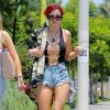 Bella Thorne, cheveux rouges, se promène, assez dénudée, dans les rues de Beverly Hills. Le 11 juillet 2017 © CPA / Bestimage