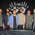 Linkin Park (Mike Shinoda, Rob Bourdon, Joe Hahn, Brad Delson, Dave Farrell, Chester Bennington) lors de l'intronisation du groupe au Guitar Center's Rockwalk à Los Angeles en juin 2014.