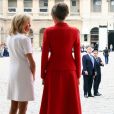 Emmanuel Macron et sa femme Brigitte Macron et Donald Trump et sa femme Melania Trump (habillée en Dior) aux Invalides à Paris, le 13 juillet 2017. © Sébastien Valiela/Dominique Jacovides/Bestimage